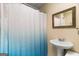 Simple bathroom with pedestal sink and shower at 2800 S Highway 16, Carrollton, GA 30116