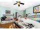 Main bedroom with wood flooring and built-in seating at 2800 S Highway 16, Carrollton, GA 30116