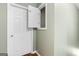 Small closet with additional storage above at 2800 S Highway 16, Carrollton, GA 30116
