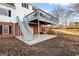 Deck with stairs leading to patio at 2800 S Highway 16, Carrollton, GA 30116