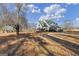 Spacious two-story house with a wraparound porch and expansive yard at 2800 S Highway 16, Carrollton, GA 30116