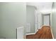 Light and bright hallway with hardwood floors and neutral walls at 2800 S Highway 16, Carrollton, GA 30116