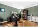 Home office features built-in shelving and hardwood floors at 2800 S Highway 16, Carrollton, GA 30116