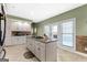 Island kitchen with granite countertops and access to backyard at 2800 S Highway 16, Carrollton, GA 30116