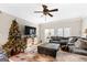 Spacious living room with sectional sofa and a Christmas tree at 2800 S Highway 16, Carrollton, GA 30116