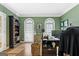 Home office with built-in shelving and hardwood floors at 2800 S Highway 16, Carrollton, GA 30116