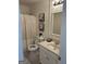 Bathroom with white vanity, toilet, and shower at 3426 Carrollton Villa Rica Hwy, Carrollton, GA 30116