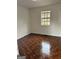 Empty bedroom with tile flooring and a window at 3426 Carrollton Villa Rica Hwy, Carrollton, GA 30116