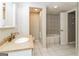 Basement bathroom with tiled shower and bathtub at 463 Swan Dr, Hiram, GA 30141