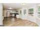 Modern kitchen with stainless steel appliances and hardwood floors at 463 Swan Dr, Hiram, GA 30141