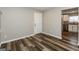 Dining area with vinyl flooring and kitchen access at 5661 Dillwood Cres, Lithonia, GA 30058