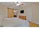 Bright bedroom featuring a barn door to en-suite bathroom at 435 Crabapple Rd, Fayetteville, GA 30215