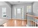 Bright entryway with hardwood floors and staircase at 5690 Cedar Pass, Fairburn, GA 30213