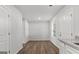 Simple dining area with hardwood floors and neutral walls at 7270 Crestside Dr # 63, Austell, GA 30168