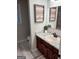 Updated bathroom features a vanity with granite countertop at 2193 Hiram Douglasville Hwy, Hiram, GA 30141