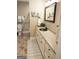 Updated bathroom features a copper sink, granite countertop, and large mirror at 2193 Hiram Douglasville Hwy, Hiram, GA 30141