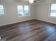 Spacious bedroom with wood-look floors at 2193 Hiram Douglasville Hwy, Hiram, GA 30141