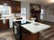 Kitchen boasts an island with granite countertops and stainless steel appliances at 2193 Hiram Douglasville Hwy, Hiram, GA 30141