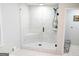Modern shower with marble tile, glass enclosure, and built-in bench seat at 2193 Hiram Douglasville Hwy, Hiram, GA 30141