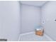 Convenient laundry room with patterned floor and storage space at 1883 Fort Valley Dr, Atlanta, GA 30311