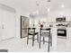 Modern kitchen with white cabinets and stainless steel appliances at 1883 Fort Valley Dr, Atlanta, GA 30311