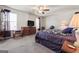 Main bedroom with king-size bed and ample closet space at 453 Camp Hill Ln, Jonesboro, GA 30238