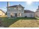 Two-story house with backyard patio and landscaping at 453 Camp Hill Ln, Jonesboro, GA 30238
