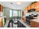 Bright kitchen features ample cabinetry, a breakfast nook, and modern appliances at 453 Camp Hill Ln, Jonesboro, GA 30238