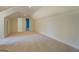 Large bedroom with access to another room and neutral colored walls at 960 Todd Dr, Covington, GA 30014