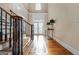 Two-story foyer with hardwood floors and elegant staircase at 745 Woodscape Trl, Johns Creek, GA 30022