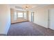 Main bedroom with bay window and carpeted floor at 6195 Winston Trce, Mcdonough, GA 30252