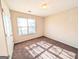 Bright bedroom with carpet flooring and neutral walls at 6195 Winston Trce, Mcdonough, GA 30252