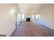 Spacious living room with vaulted ceiling, fireplace, and access to other rooms at 6195 Winston Trce, Mcdonough, GA 30252