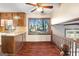 Kitchen boasts a breakfast bar and backyard views at 4043 Stonemont Sw Dr, Lilburn, GA 30047