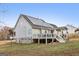 House exterior with deck and solar panels at 1144 Pickets Ridge Dr, Locust Grove, GA 30248