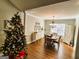 Bright dining room with hardwood floors and chandelier at 220 Woodgate Cir, Fayetteville, GA 30214