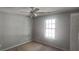 Bedroom with ceiling fan and window at 221 Lakeview Dr, Stockbridge, GA 30281