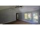 Bright living room with backyard access and vaulted ceiling at 221 Lakeview Dr, Stockbridge, GA 30281