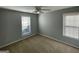 Bright bedroom with neutral walls and window coverings at 120 Oakview Trce, Fayetteville, GA 30215