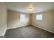 Bright bedroom with neutral walls and carpeted floors at 4395 Stonewall Tell Rd, College Park, GA 30349