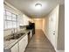 Newly renovated kitchen, featuring granite countertops and stainless steel appliances at 4395 Stonewall Tell Rd, College Park, GA 30349