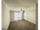 Living room with carpet, ceiling fan and neutral wall color at 795 Nw Amber Nw Pl, Atlanta, GA 30331