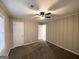Spacious bedroom with neutral carpeting and ceiling fan at 2442 Graywall St, East Point, GA 30344