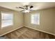 Bright bedroom with neutral carpeting and ceiling fan at 2442 Graywall St, East Point, GA 30344
