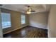 Bright bedroom with hardwood floors and ceiling fan at 1768 Glen View Way, Hampton, GA 30228