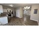 Eat-in kitchen with granite countertops and stainless steel appliances at 1768 Glen View Way, Hampton, GA 30228