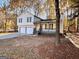 Two-story house with two-car garage and front porch at 473 Amy Blvd, Temple, GA 30179