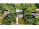 House with pool, surrounded by lush green trees at 577 Charing Cross Dr, Marietta, GA 30066