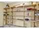 Storage area with pegboard walls and shelving units at 577 Charing Cross Dr, Marietta, GA 30066