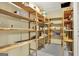 Basement storage room with shelving for extra storage at 577 Charing Cross Dr, Marietta, GA 30066